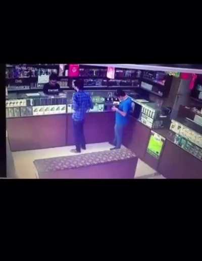 Guy lights up a cigarette in a store with unexpected gas leak