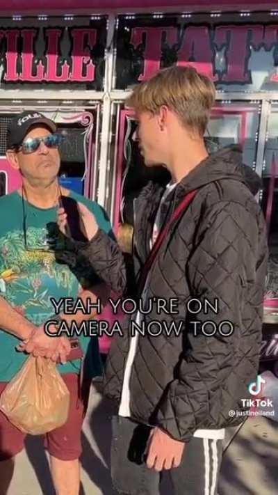 Drunk guy interrupts street interview.