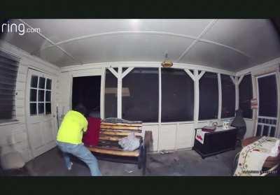 Man fights off bear trying to attack his dogs.