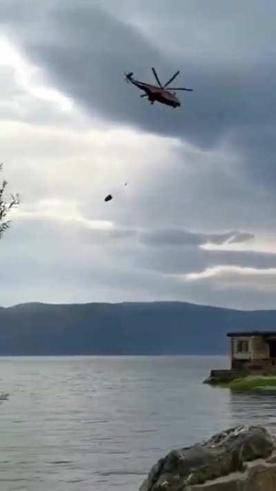 Firefighting Helicopter suddenly loses control.