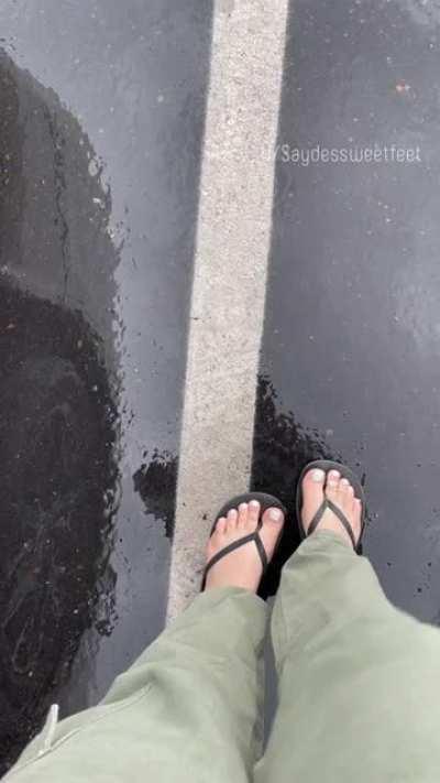 Playing in the rain my soles are soaked 💦💦