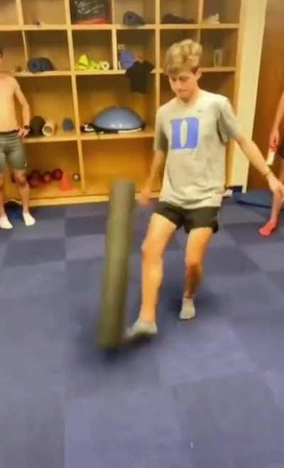 Kicking a foam roller