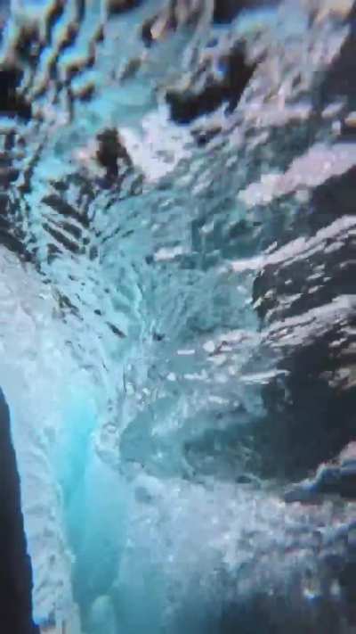 An amazing capture of a whirlpool under a river