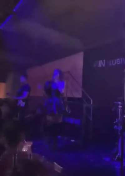Guy tries to film under singer's skirt despite being warned twice