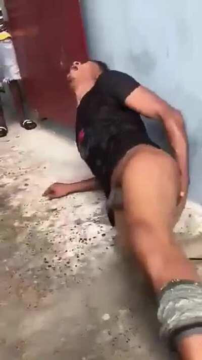 [NSFW] Thief in Guyana receives a beating from community vigilantes