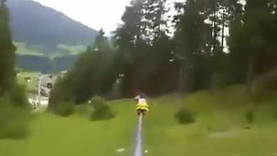 Alpine coaster slow girl gets kicked by angry guy they were holding up