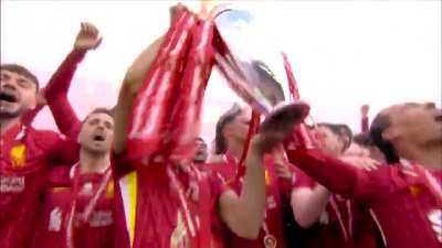 Liverpool FC lifting the 24/25 Premier League trophy