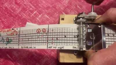 “Tainted Love” hand-punched for a hand-cranked music box by cartoonist Andy Riley.