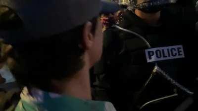 Armed protestors confront riot police in San Antonio, side by side with unarmed protestors, pledging to protect the rights and lives of the people.