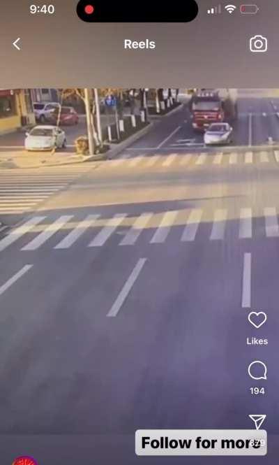 Semi truck flattens car