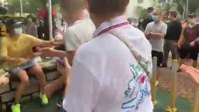 Several associates of a pro-Beijing politician filmed restraining a youngster who can be heard saying he 