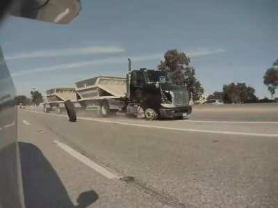 Thought I was clear of danger when I accelerated past this truck going 70 on a flat. Heard the squeal of metal and turned to see this outside my window.