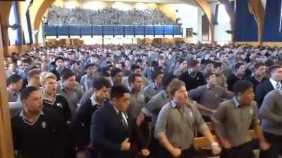 Students honoring retiring teacher with Haka