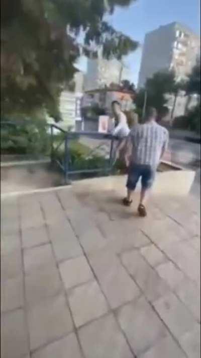 Anti-masker vs. Sausage wielding dude