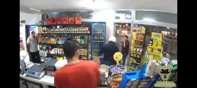 Armed Robber Gets Greedy, Shoots Himself & Takes the Room Temperature Challenge