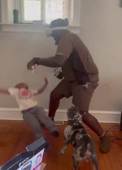 Standing in front of someone playing VR boxing