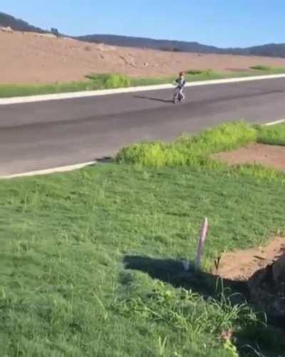 Downhill on a bike, into a fence