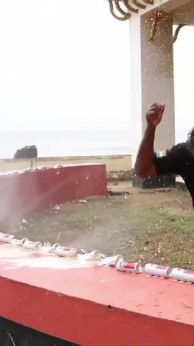 John Paul K R sets a Guinness World Record by the Most drinks cans crushed while holding an egg in 30 secs! He did 52!!! He said he hand was of no use for over a week - big surprise there mate!!!