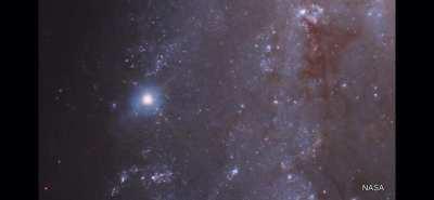 This is a supernova located 70,000,000 light years away, and it exploded around the dinosaur era, but we are just now seeing it due to the speed of light.