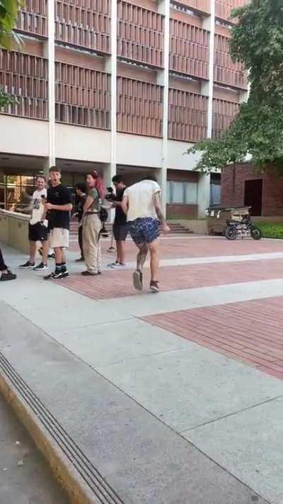 Doing a flip on some stairs