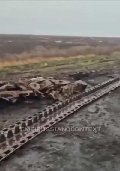 A broken column of Russian armored vehicles. The location and time are unknown.