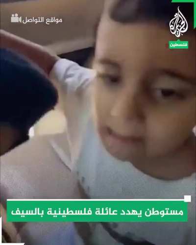 A guy with a sword attacks a lady and her child on the side of the road