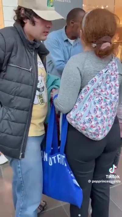 Woman boos Palestinian freedom protesters and spits on a little girl before making a racist remark 