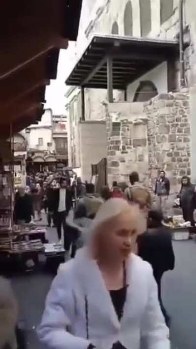 Hayaat Tahrir Al sham shaming men who were caught cat-talking women publicly.