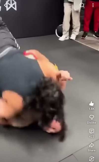 Did the guy in black take the other guy down?