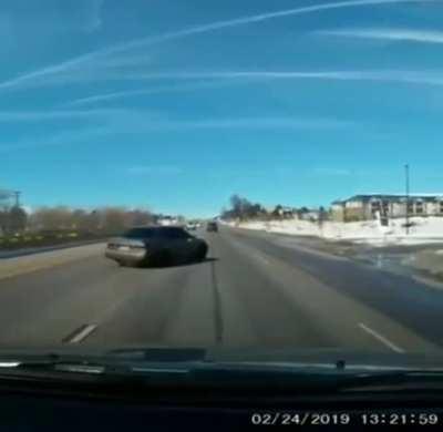 This idiot passing at high speed through a puddle