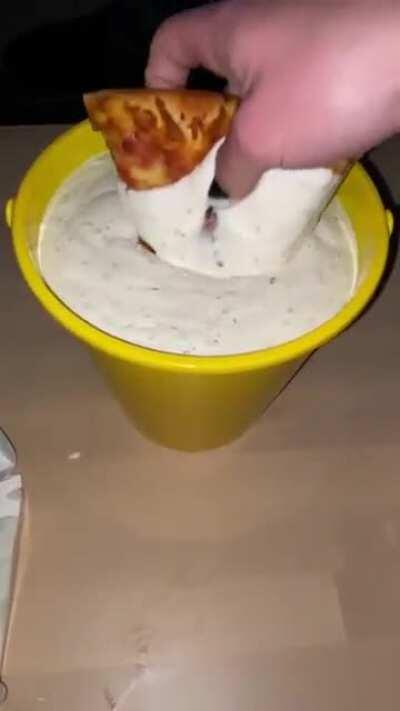 This man just ruined a delicious slice of pizza.