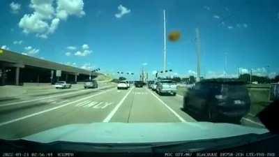 An 18 wheeler drives off a bridge US-75 near Stacy Road.
