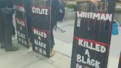 Columbus protesters create big signs lined with the names of specific Columbus Police officers & their acts of violence
