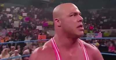 Kurt Angle threatening Rey Misterio