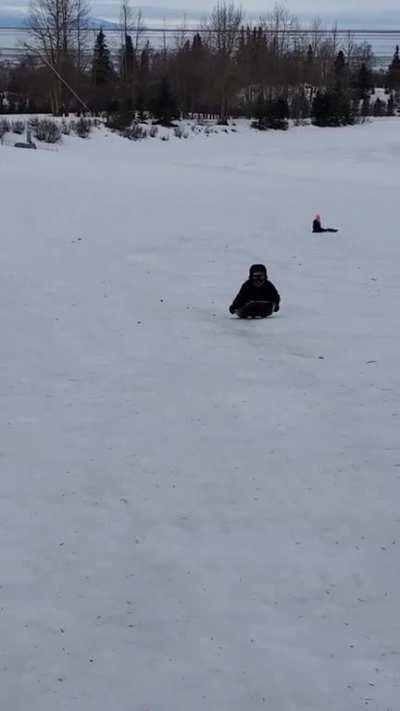 Dad Finds A Way To Make His Boy's Sledding Adventure Easier