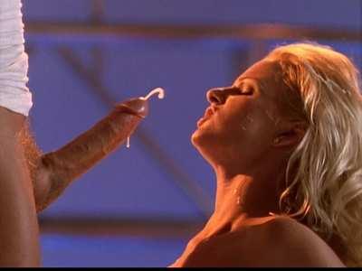 Nikki Tyler blows Peter North until he blasts her with a load that's impressive even by his standards. (1998)