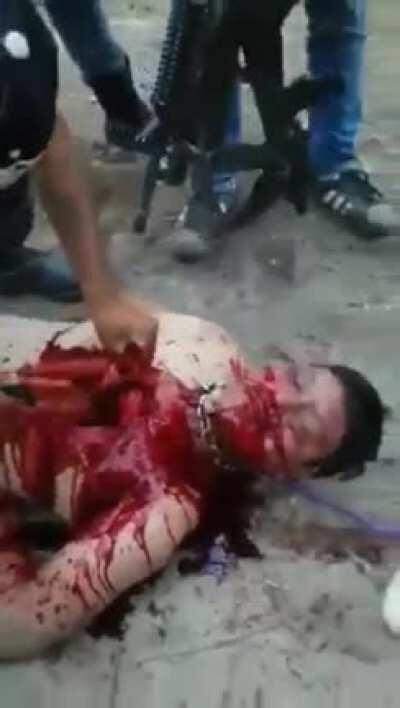 CJNG cartel gut rival open — Cut out piece of his heart and eat it (Have a Heart, Man?)