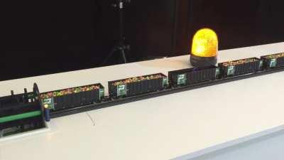 A working rotary dumper I built a few years ago. Fully automated with carriage identification and rotary couplers.