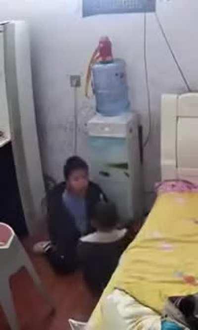 Choking child gets kung fud into life again by his big brother.