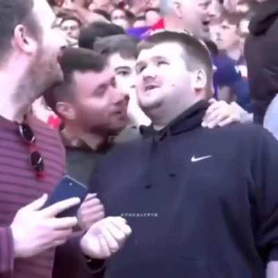 Man describes the match events to his blind friend.