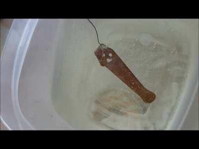 My home anodizing setup turns bare titanium to to blue, gold, orange, then to a deep purple. The color change of the metal is in real time.