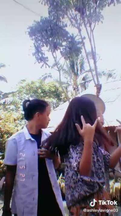 Videobombing kid falls out of a tree