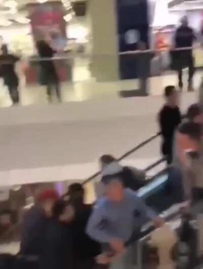 In Sochi Russia, Incredible teamwork on mall escalator to free a little girl who caught her hand in the moving staircase