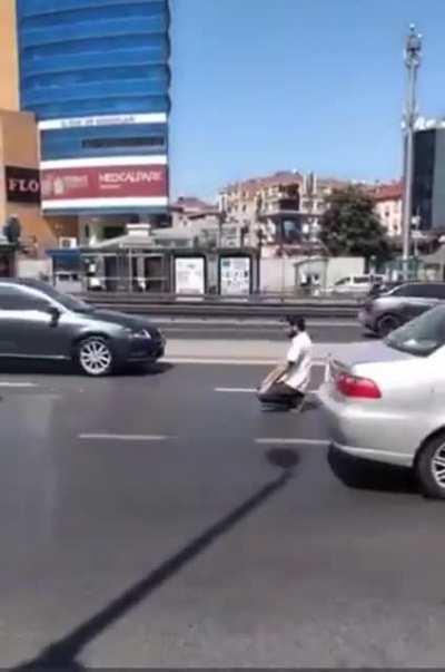 Man praying on the road