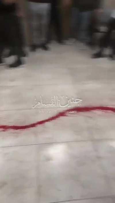 Shooting a civilian in the doorway to Jenin Government Hospital