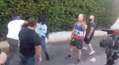 antifa activist gets punched in the face