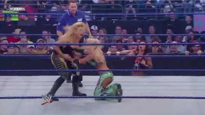 Kelly Kelly striking Natalya