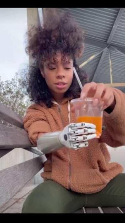 Bionic woman shows us how it&rsquo;s sometimes hard to get the right grip pressure for holding a plastic cup