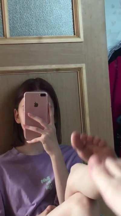 girl removes her sock for you