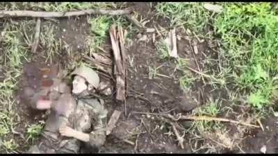 Russian in pain after getting hit by a drone drop. Donetsk region. 